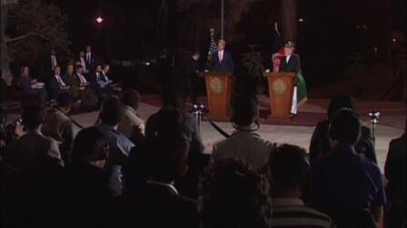 Kerry, Karzai resolve parts of security deal 