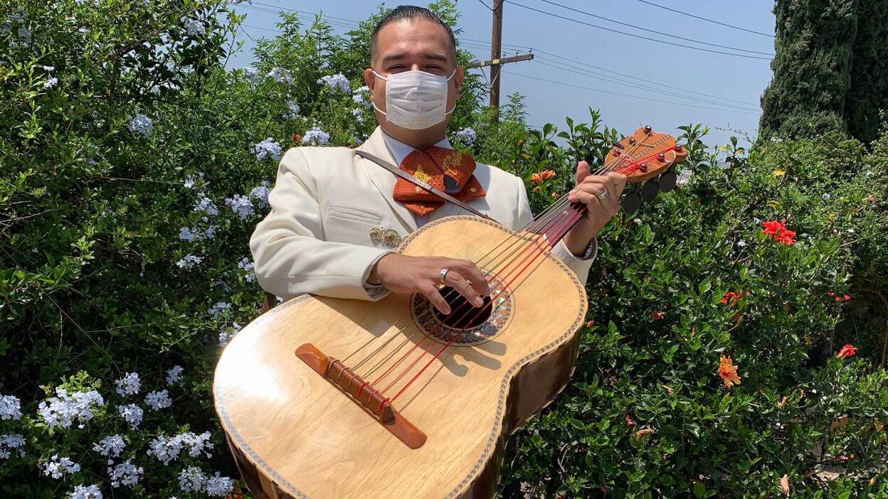 Joel Jacques of Mariachi Los Criollos de Guadalajara holds his guitarrón before a Los Angeles gig. | Courtesy of Joel Jacques