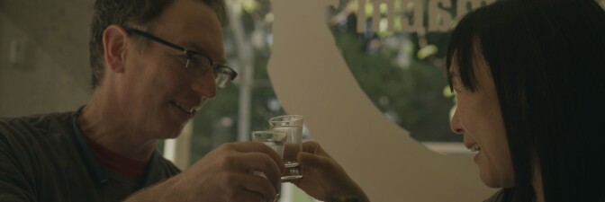 Jake Myrick and Noriko Kamei enjoying their freshly brewed sake | Still from "The Migrant Kitchen" Sequoia Sake