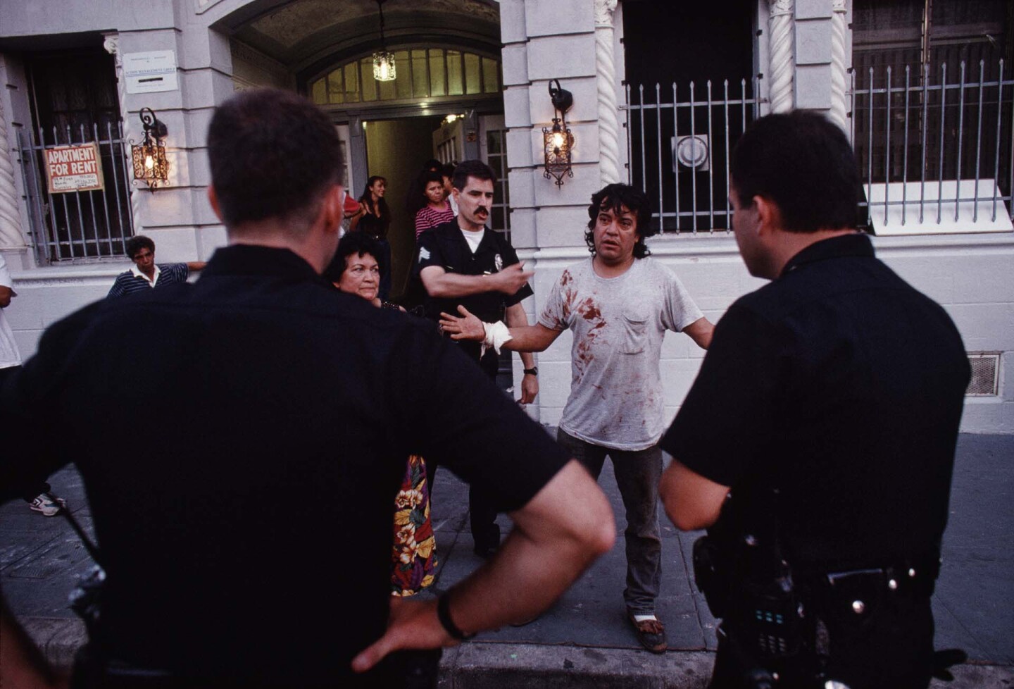LAPD Rampart division officers feel the heat from all sides — from the mayor, their superiors and citizens like this man, assaulted by gang members, who complains about the lack of police protection. | Joseph Rodriguez
