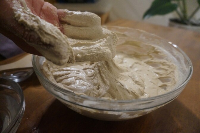 Mixing injera batter at home I Comfort Azubuko