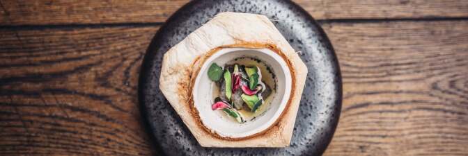 Migrant Kitchen Japanese episode. Chef Tetsu of Wolfgang Puck's crudo with the black cod | Courtesy of Life & Thyme