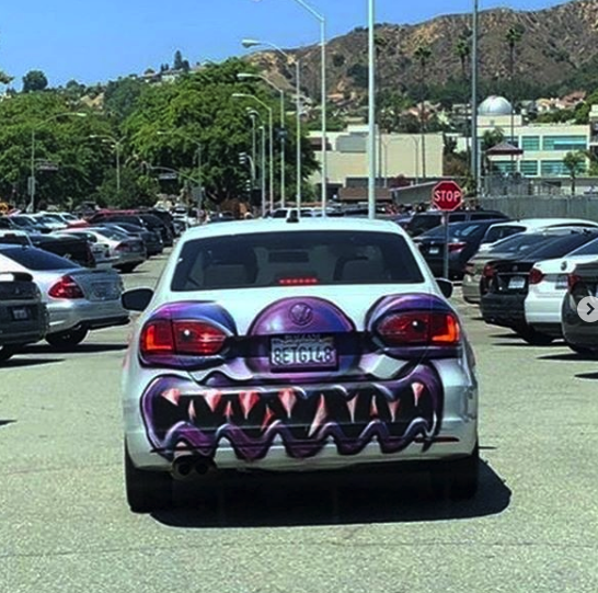 A Volkswagen sedan bombed by Kenny Scharf for his "Karbombz!" project | Courtesy of the artist