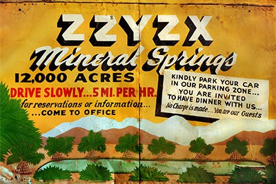 A sign welcoming travelers to Zzyzx | Jason Wallace/CSU Desert Studies Center