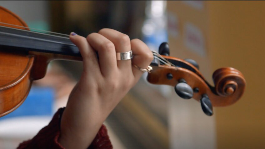 A girl plays the violin