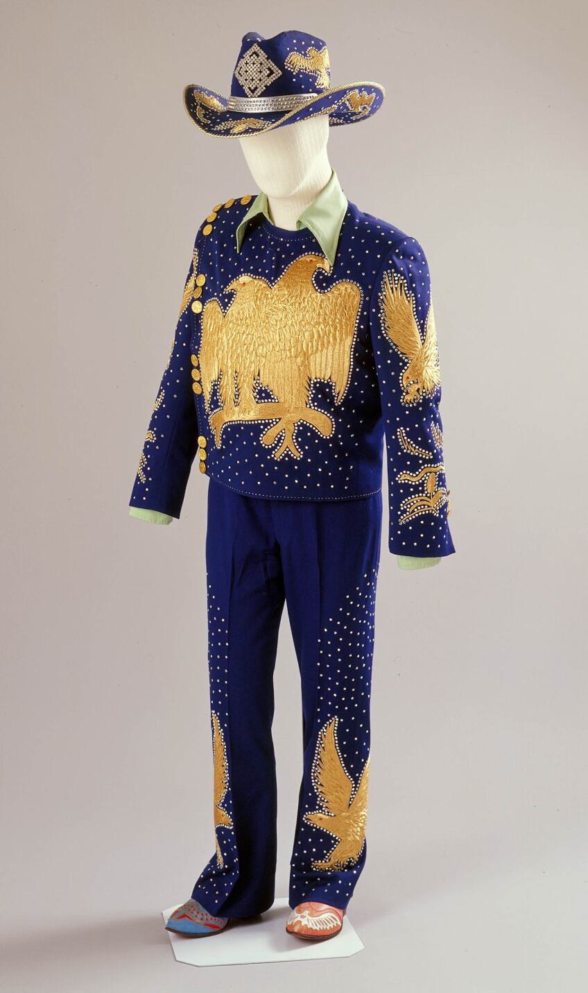 Nudie's outfit with rhinstones and embroidery along with his mismatched boots | Courtesy of the Autry Museum of the American West