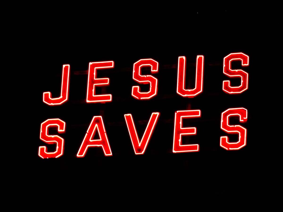 The Ace Hotel’s neon “JESUS SAVES” sign. | Sandi Hemmerlein