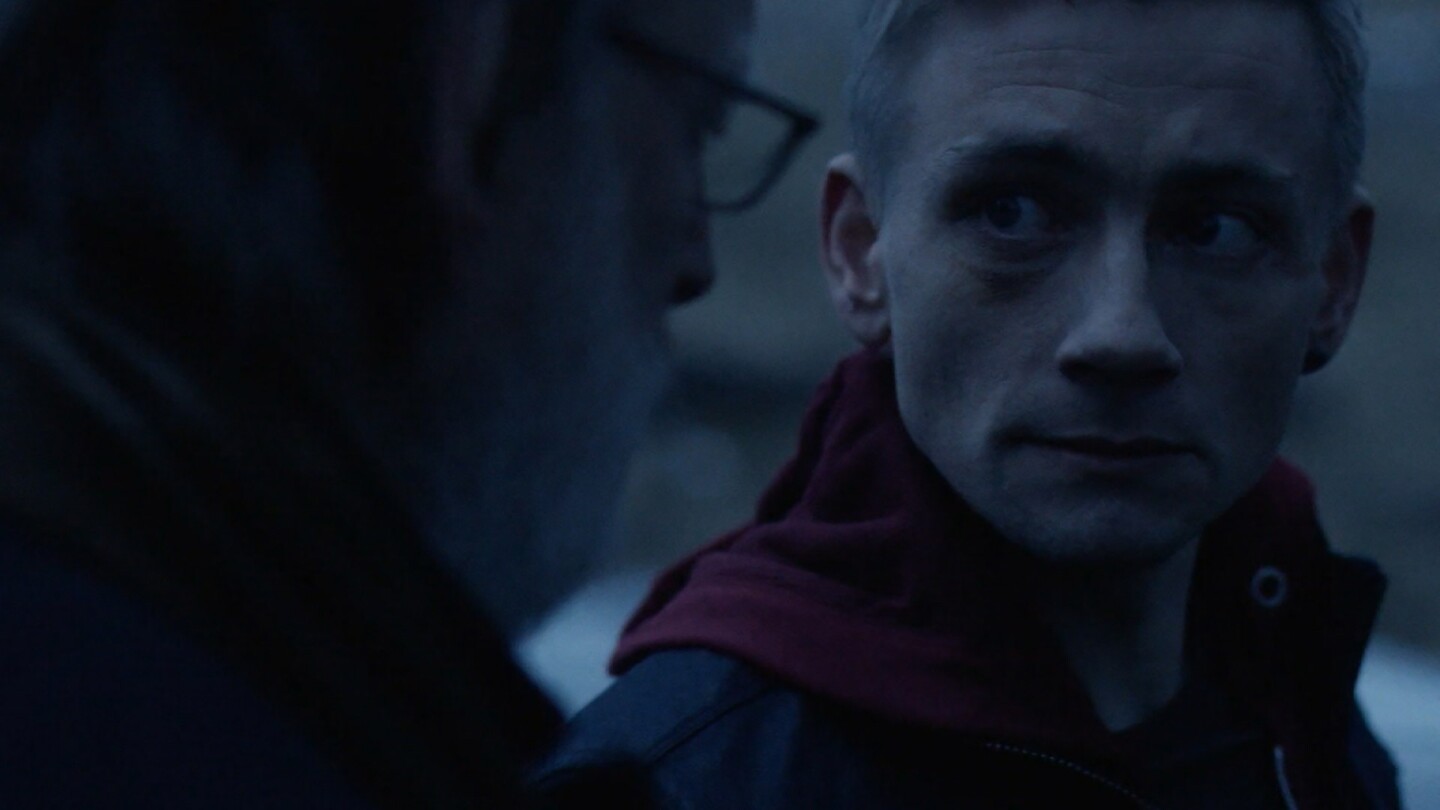 Two men facing each other. Still from "Follow the Money" Season 2, Episode 7