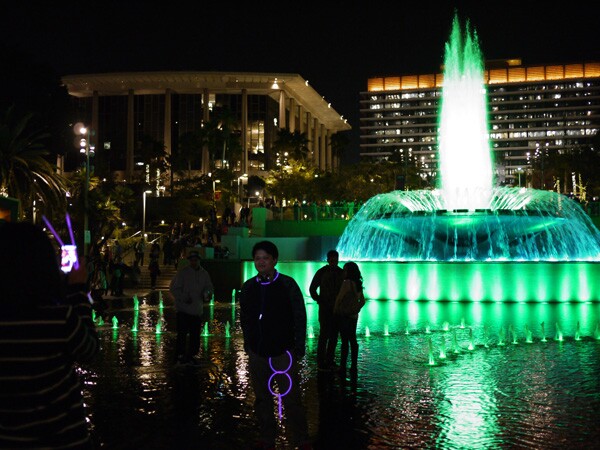The lighted up fountain is a popular spot to take pictures by