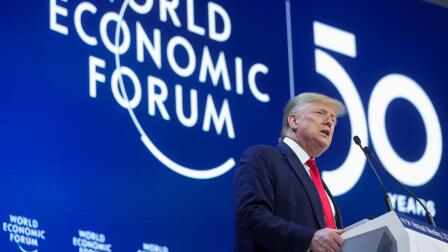 In Davos, Trump hails U.S. 'economic boom,' downplays trial