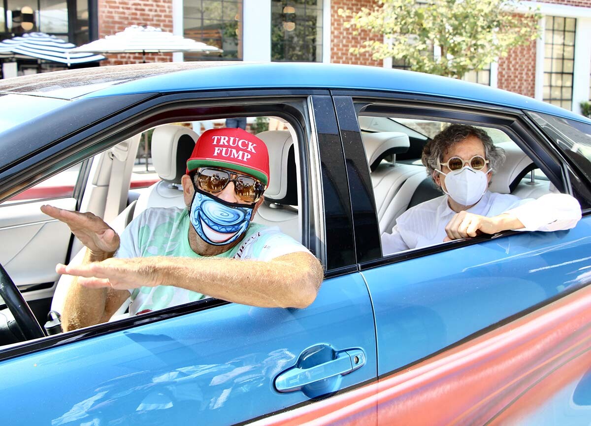Kenny Scharf and Jeffrey Deitch inside a car during the "Karbombz!" car parade | Jordan Riefe