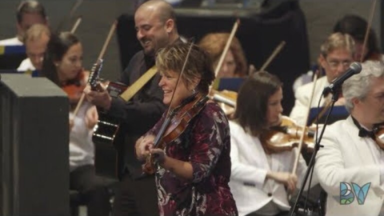 Band playing string instruments.