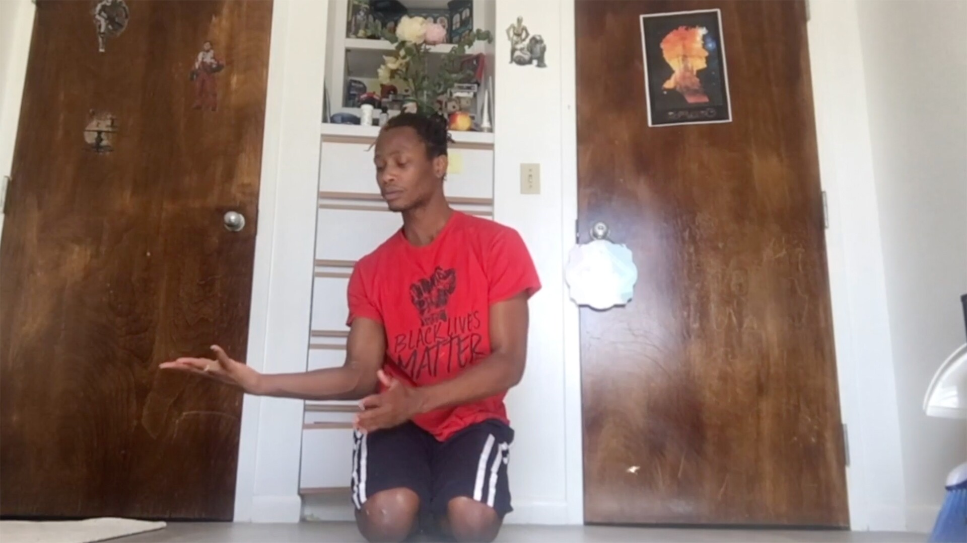 A young man in a red shirt performing a dance on Black Lives Matter, one of Invertigo's Dance Care Package performances | Courtesy of Invertigo