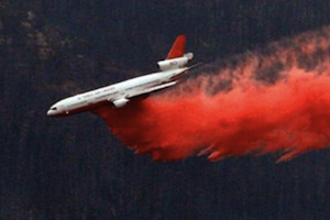 A Very Large Air Tanker (VLAT) drops retardant on the fire. | Photo: Courtesy Inciweb