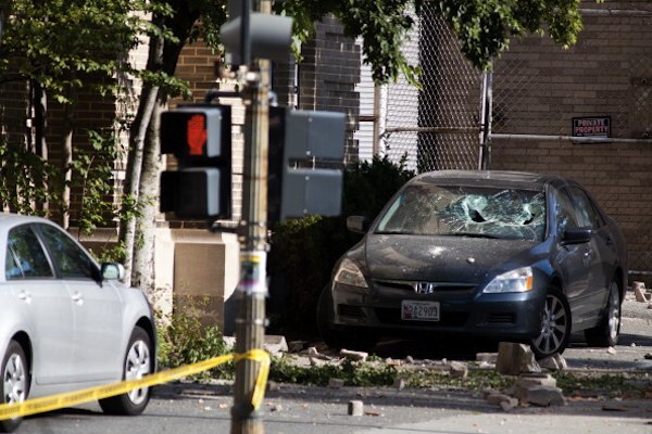 A car parked in front of the Embassy of Ecuador in Washington D.C. suffered damaged from falling bricks during a 5.8 earthquake that struck the Eastern United States on August 23 (Photo by Brendan Hoffman/Getty Images)