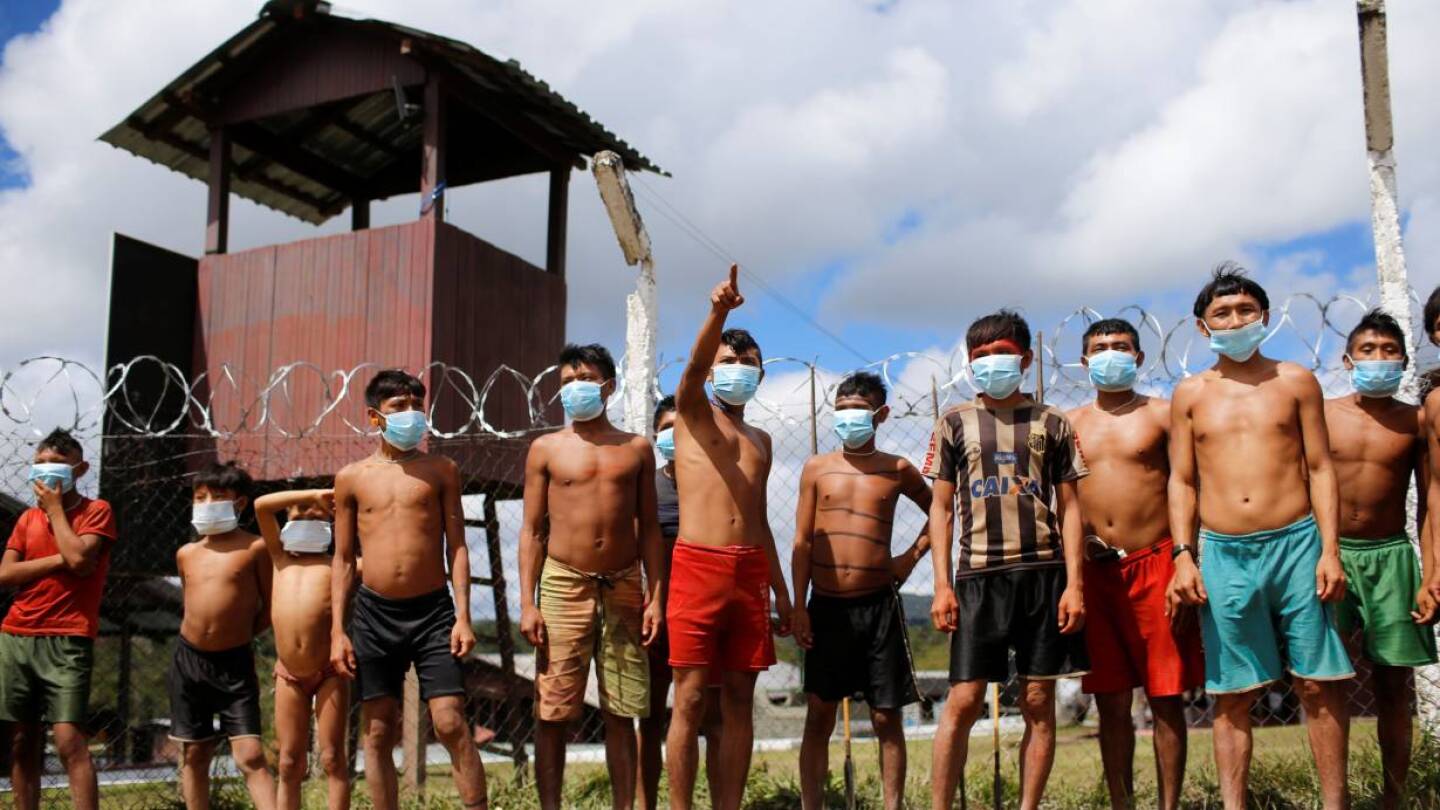 Indigenous people from Yanomami ethnic group are seen amid the spread of the coronavirus disease (COVID-19) in Brazil July 1, 2020. | REUTERS/Adriano Machado