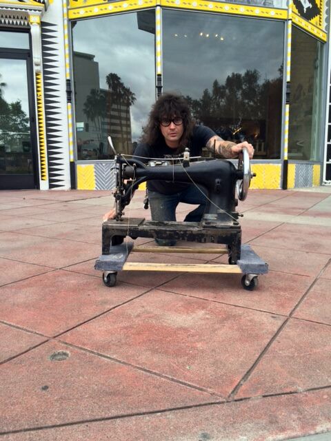 Chris Francis moving his studio equipment into the CAFAM. | Photo: Courtesy of the museum.