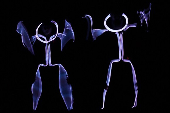 Jasmine Orpilla and Drew Thataussie dance as graph people who lose their heads. | Photo: Marianne Williams