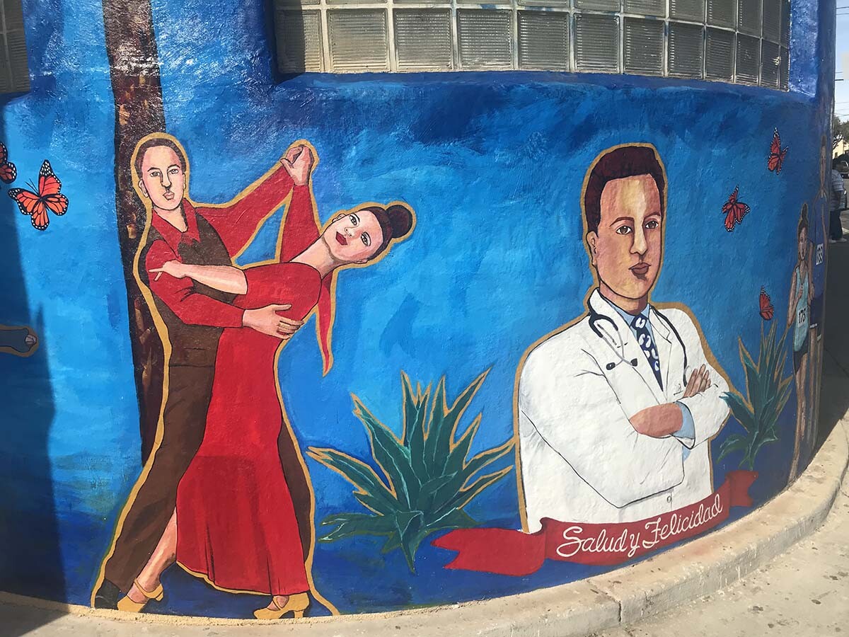 A mural in progress on an AltaMed clinic exterior by Yolanda Gonzalez | Courtesy of AltaMed