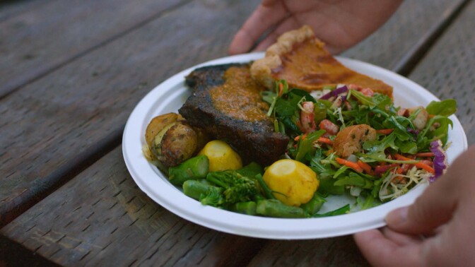 A meal prepared by Bracken's Kitchen from food diverted from landfills. | Still from "Broken Bread"