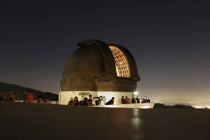 Exterior of Griffith Observatory's telescope at night. | Wikimedia Commons/ Dancorona21/Creative Commons (CC BY-SA 4.0)