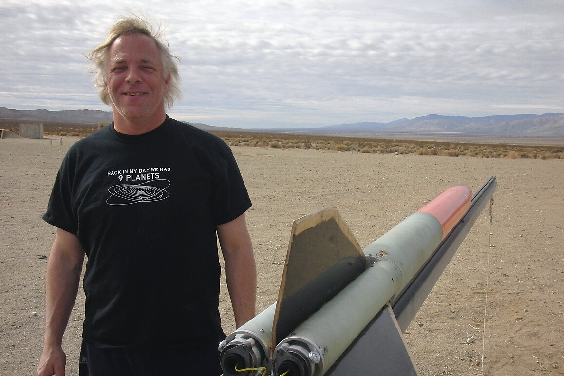 Paul Breed Sr. with rocket at FAR, Cantil, CA. | Courtesy of FAR