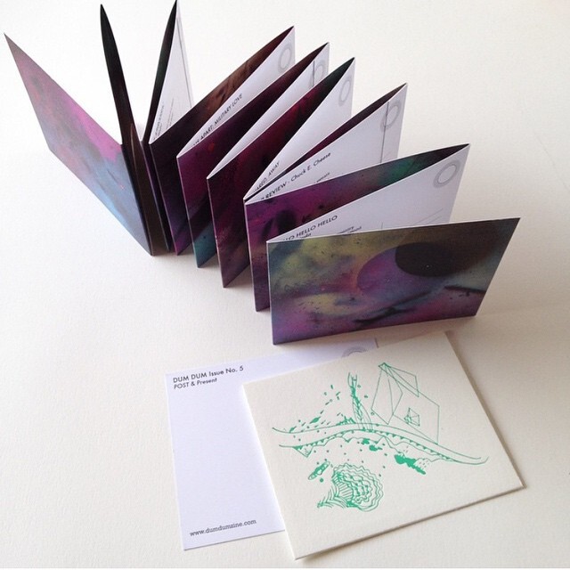 A zine folded accordion style sits on a white background.