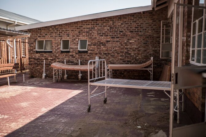 Beds stand in a courtyard outside the COVID-19 Ward of the Taung Hospital in Taung, the North West Province, South Africa, on September 4, 2020. | Thomson Reuters Foundation/Gulshan Khan