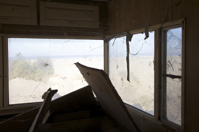 "Window View - Abandoned Mobile Home." Salton Sea, CA. 2014. | Photo: Osceola Refetoff.
