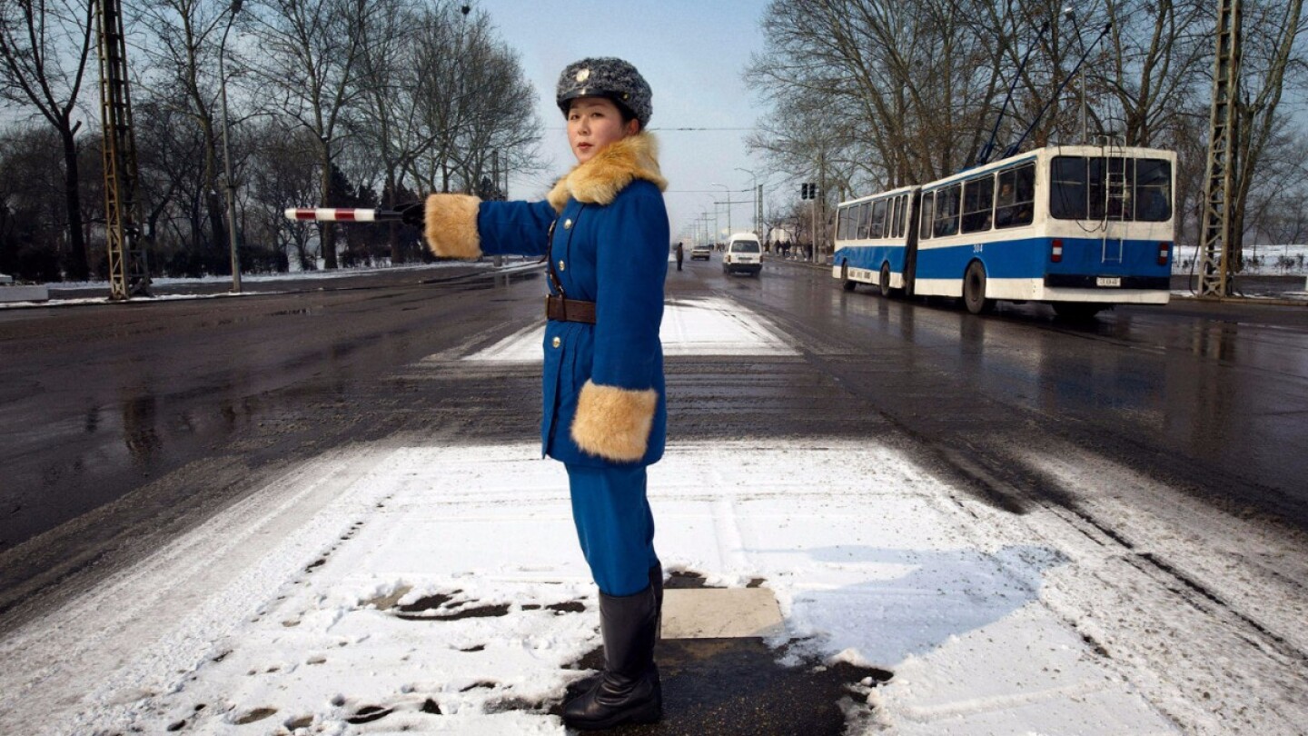 A traffic officer in uniform. Pyongyang, North Korea | Mark Edward Harris / Getty Images