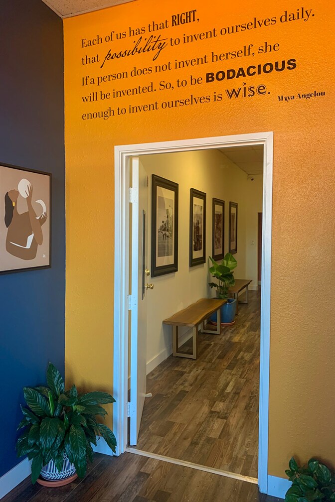 A Maya Angelou quote is painted over a doorway at Color Compton. | Courtesy of Color Compton