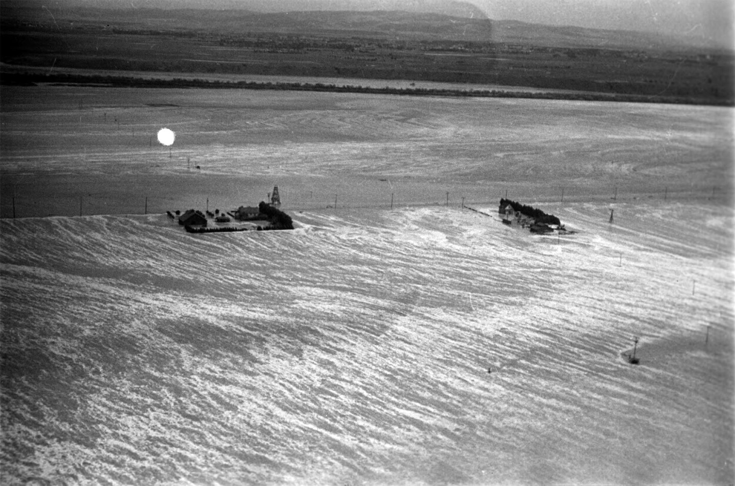 Aerial view of rushing flood waters in North Hollywood in March 1938