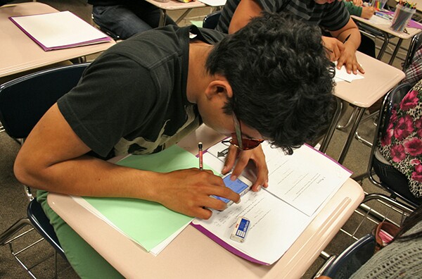Andres uses his notes and a map app on his cell phone to draw his map