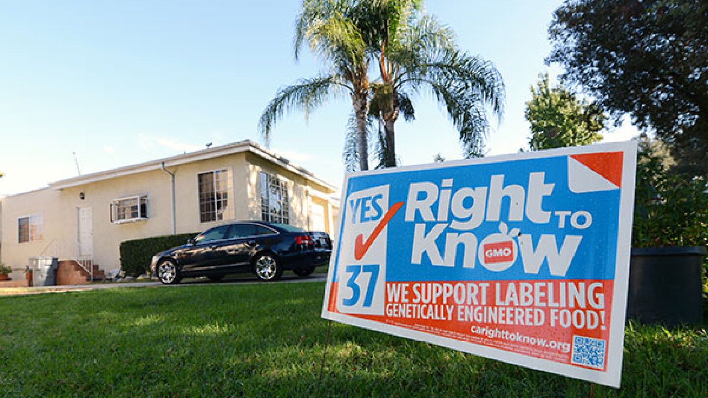 A sign supporting Proposition 37 which calls for the mandatory labeling of genetically engineered foods is seen in front of a home in Glendale, California October, 19, 2012. (Credit: ROBYN BECK/AFP/Getty Images)