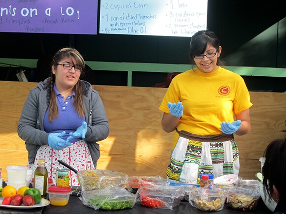 Along with ELARA classmate Liliana Guizer Serrano, Shirley leading a cooking demo at Yash La Casa Market, January 2012.