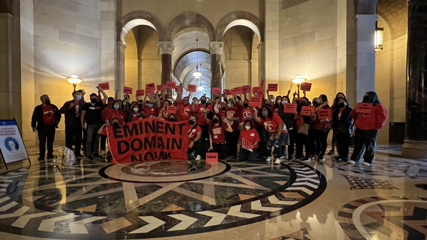 Hillside Villa community organizers gather in the rotunda of L.A. City Hall for a City Council meeting