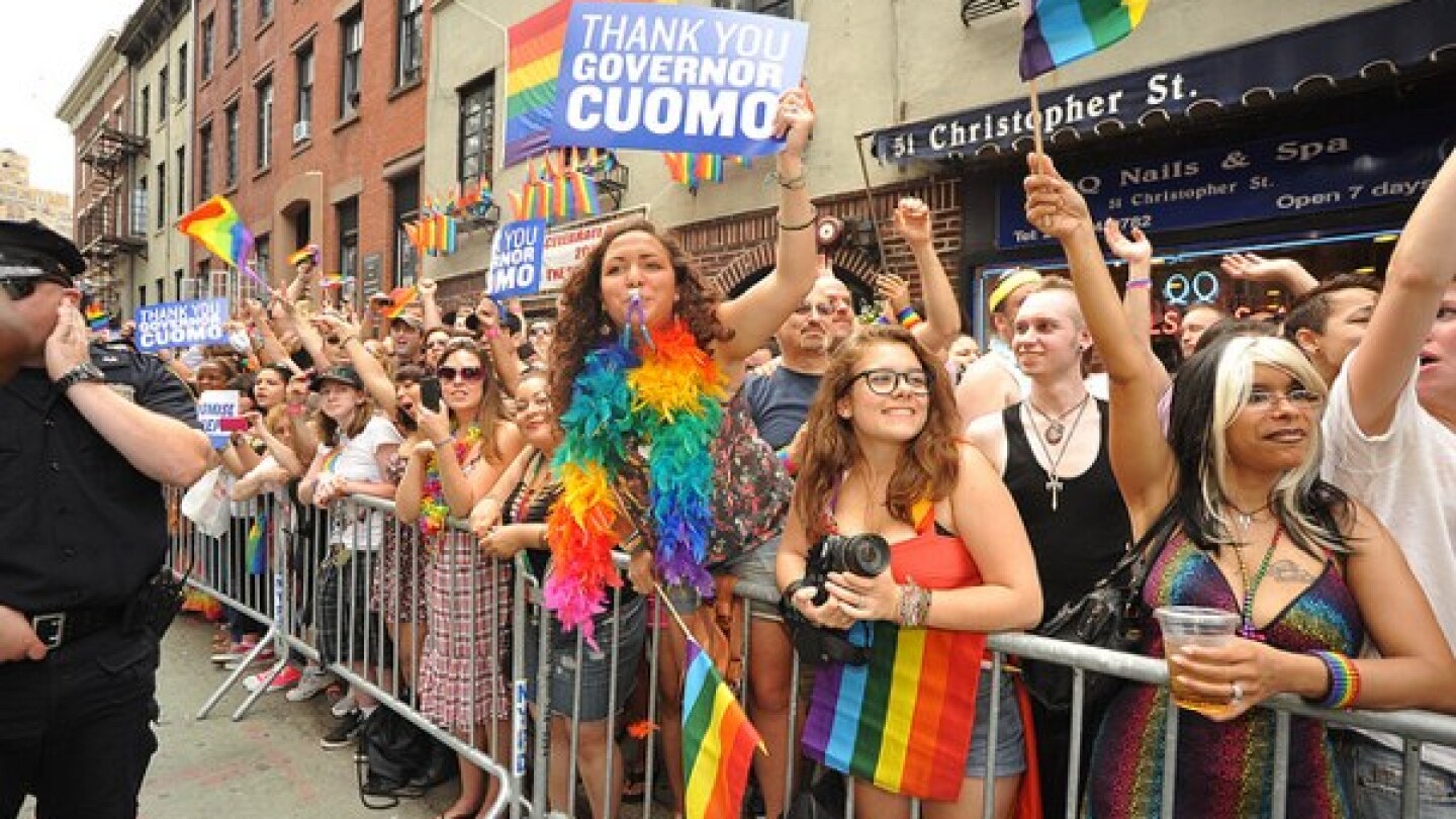 Gay pride parade celebrating the Passage of the marriage equalitylLaw in Greenwich Village, New York City
