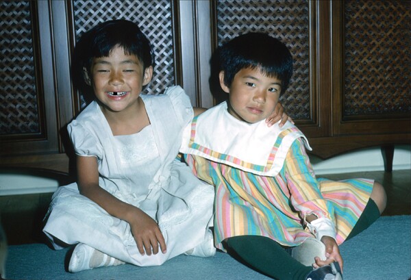 Me with my younger sister, back in the day. | Image: George Chong / My sister and I enjoying an evening at home.<br />