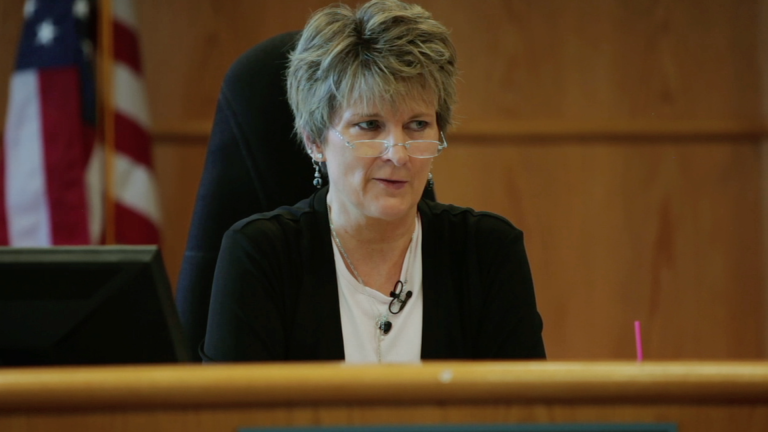 Tough Love: The "System" Assesses