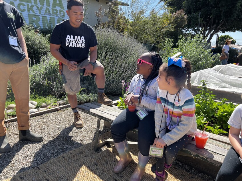 Richard Garcia, 42, going over the butterfly performance with Allyson & Isabella in the Peas in a Pod Program.