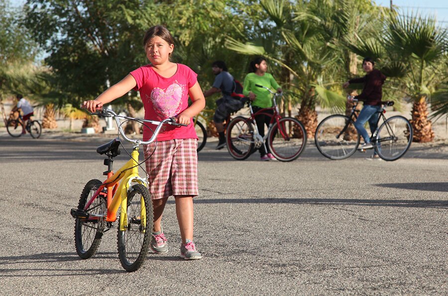 Biking between sites | Photo: Drew Tewksbury