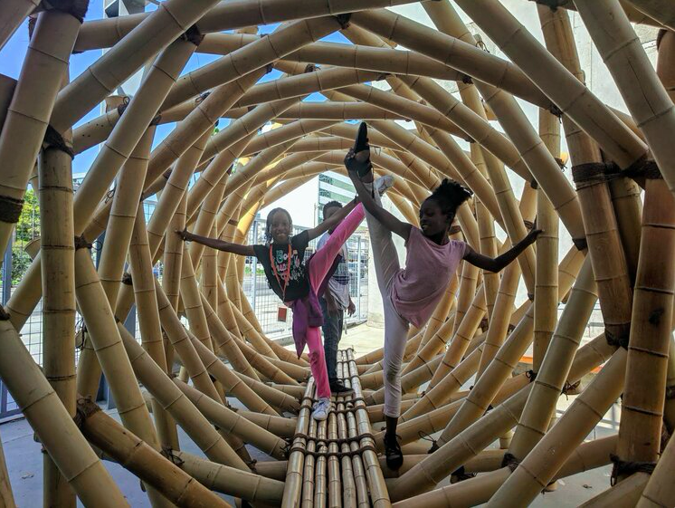 Children pose for a picture during a 2018 field trip to the Craft Contemporary, organized by Greetings From South-Central.