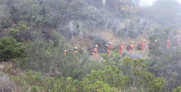 Inmates hiking a trail called Backbone.