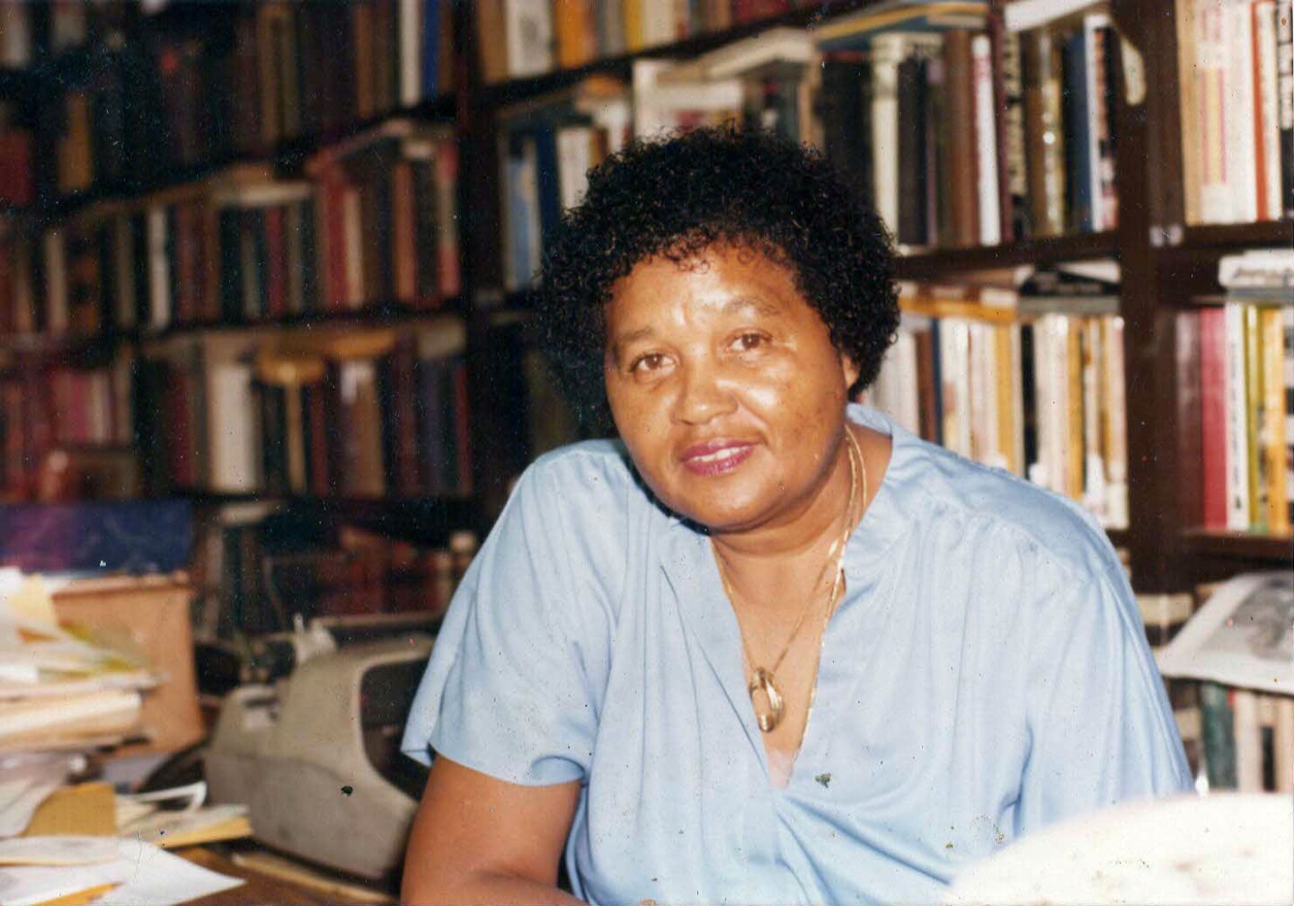 Mayme Clayton in library
