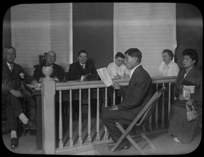 A picture bride being processed at Angel Island | Copyright 2008 California State Parks