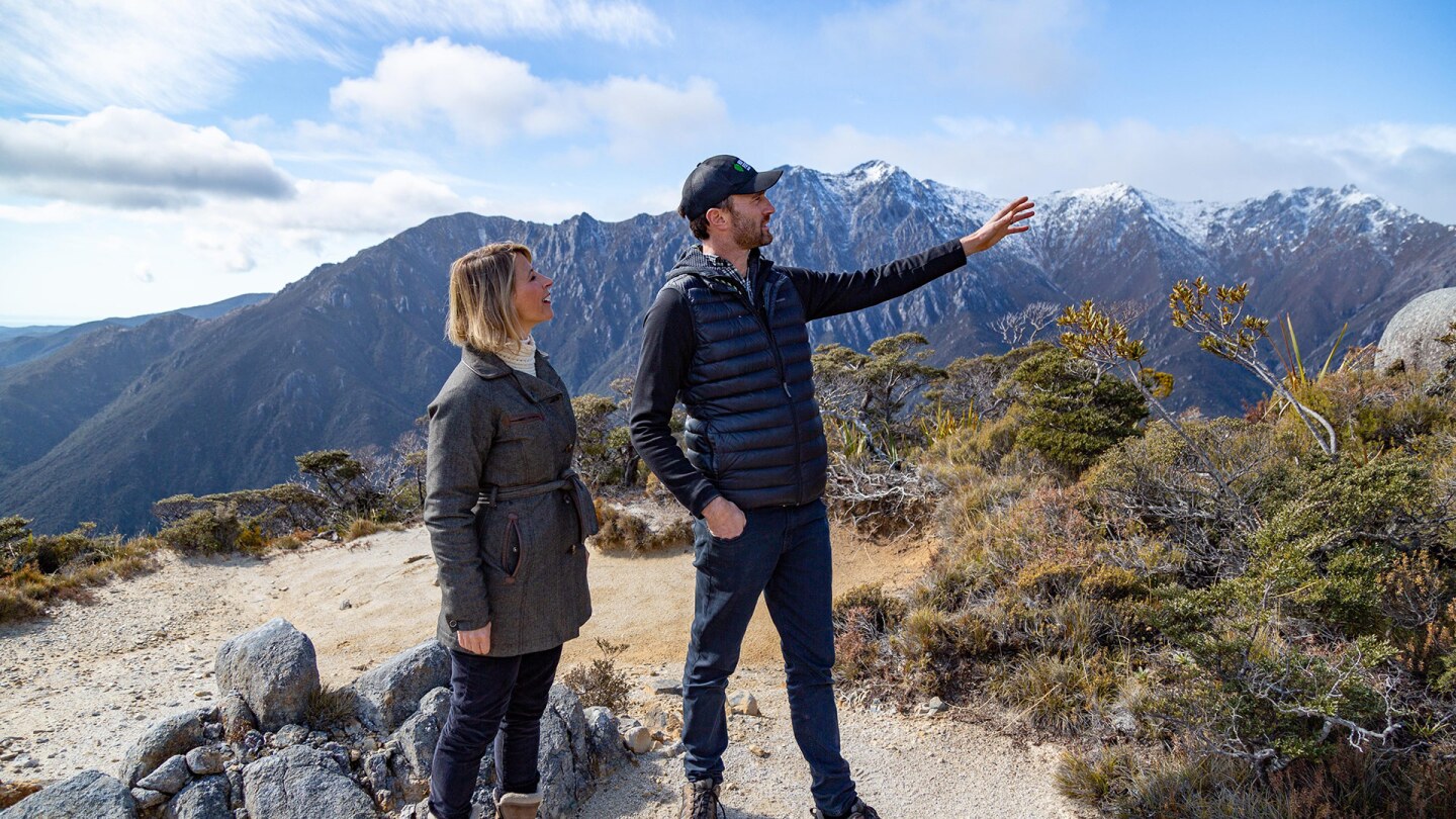 Samantha Brown looks where her guide in New Zealand is pointing.
