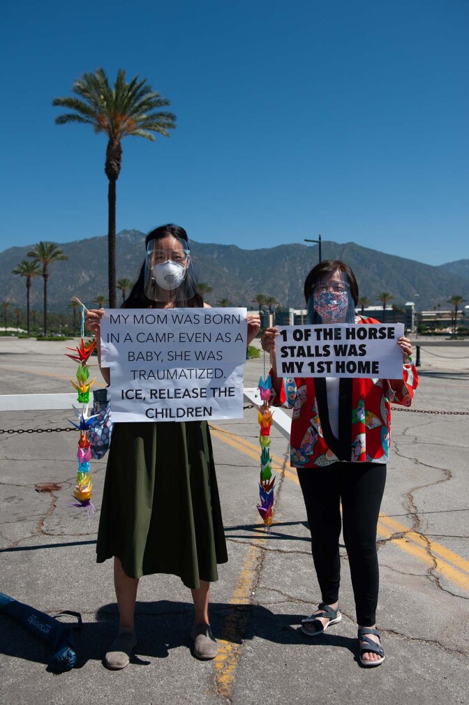 Two women in protest at the Santa Anita Assembly Center | William Camargo, In Plain Sight