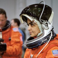 Astronaut Kalpana Chawla, STS-107 mission specialist, prepares to simulate a parachute drop into water during an emergency bailout training session in the Neutral Buoyancy Laboratory. | Flickr/NASA Johnson/Creative Commons (CC BY-NC 2.0)