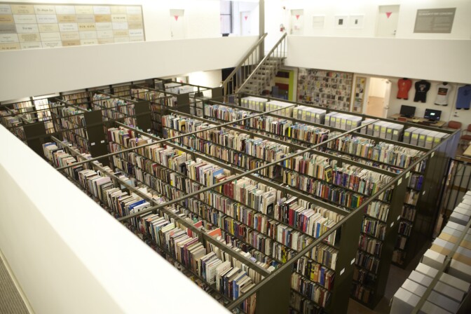 An overhead shot of bookcases filled with books.