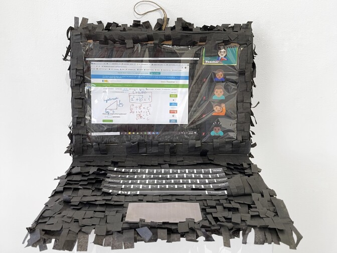 A piñata that looks like a laptop and a Zoom interface.